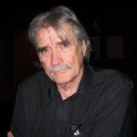 Det. Jack McPhail, retired Older man with gray hair and mustache and a serious expression
